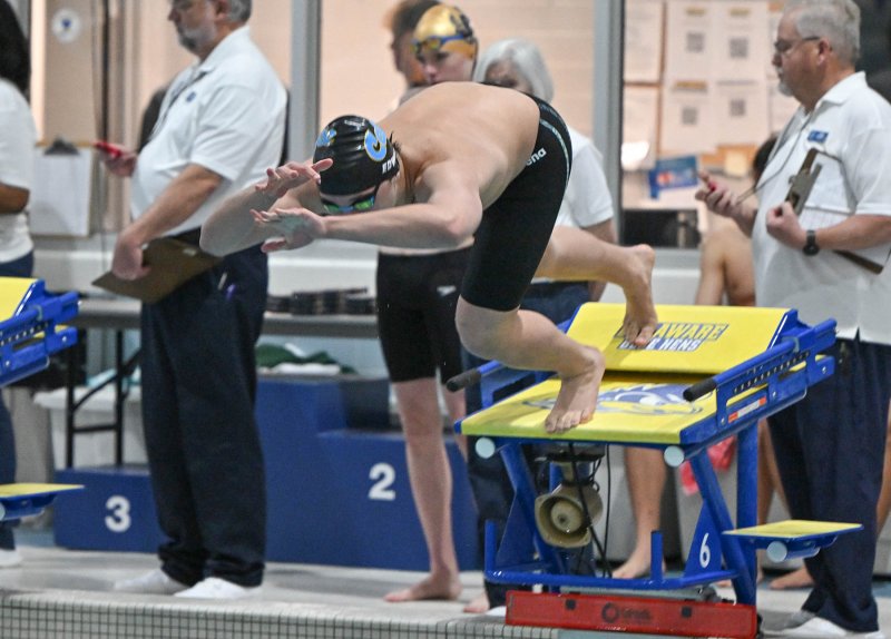 Cape’s Jaxen Edwards leaves the blocks in the 100 free.