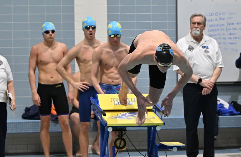 Brady Schell leaves the start in the 200 free relay.