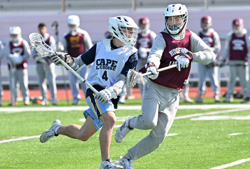 Cape sophomore Alan Grapski dodges to the goal and scores.