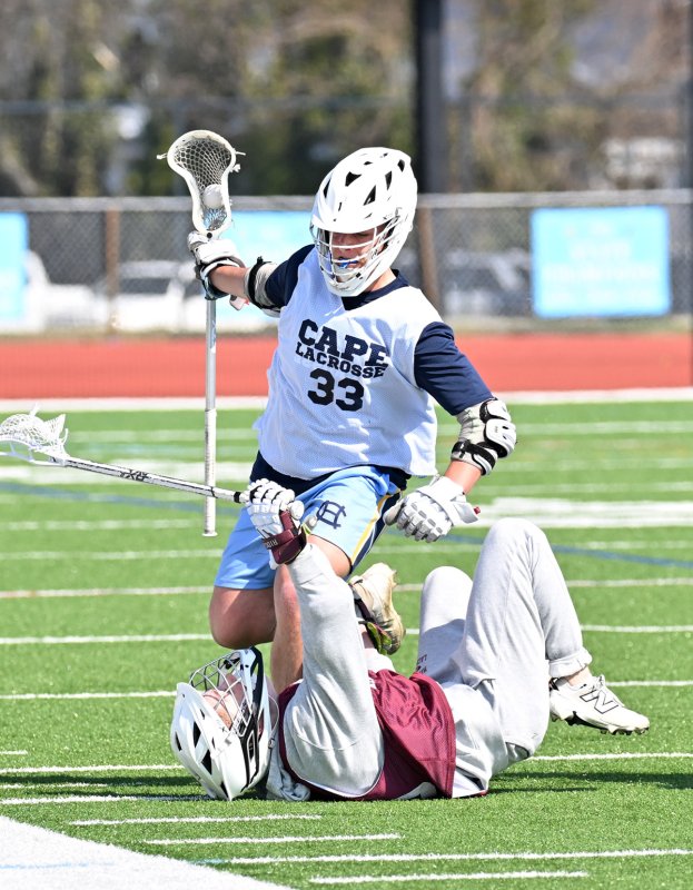Sophomore Channing Smith bull dodges through a Ridgewood defender.