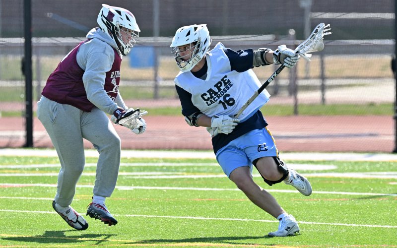 Cape senior Ryan Morgan speeds by a middie.