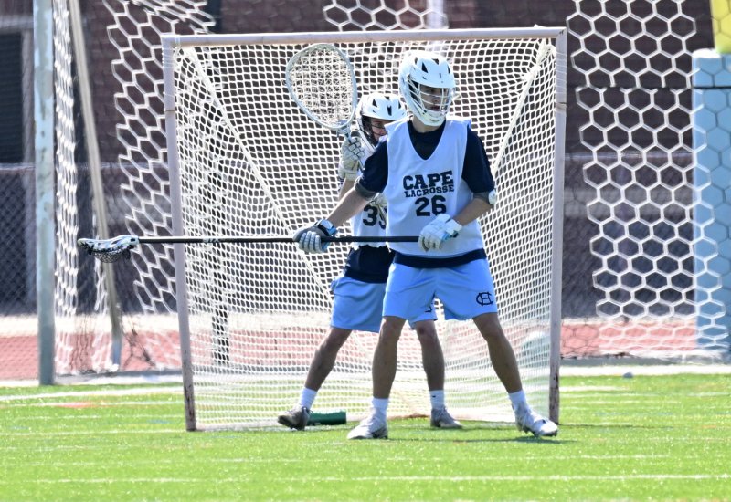Cape senior long pole defender Brooks Leonhartt protects the Vikings’ goal.