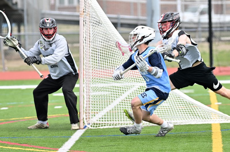 Mathew Popovich sets up around the Saints’ crease.