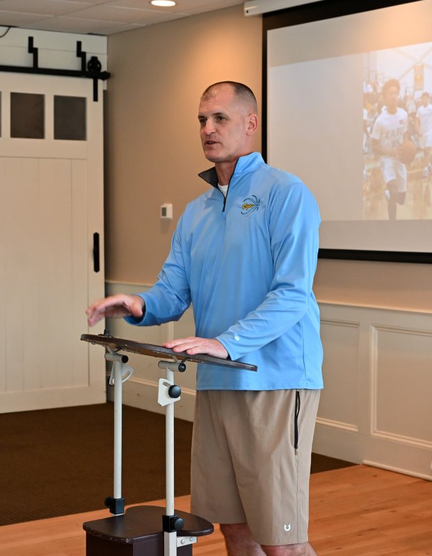 Head coach Steve Re welcomes family, the team and friends to the awards banquet.