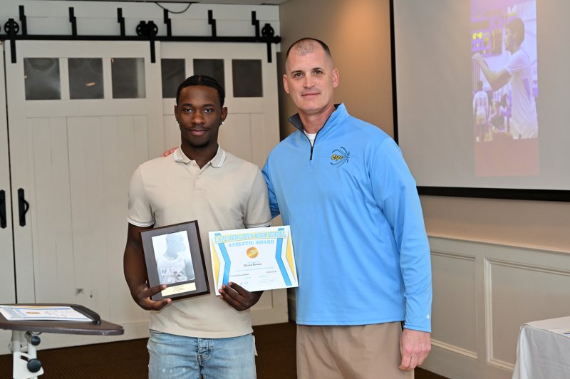 David Barnes receives a Cape Athletic Award.