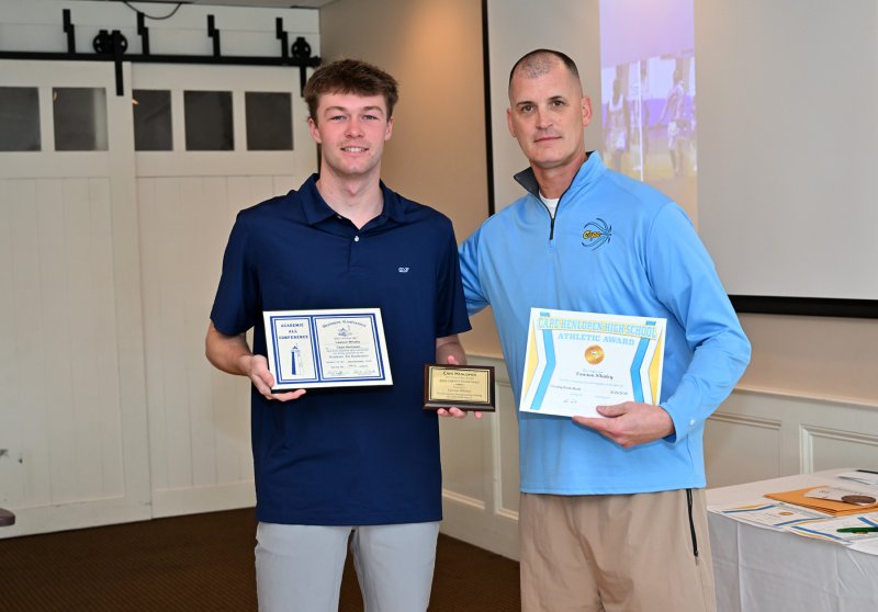 Senior Lawson Whaley receives a Cape Athletic Award and an Academic All-Conference Award.