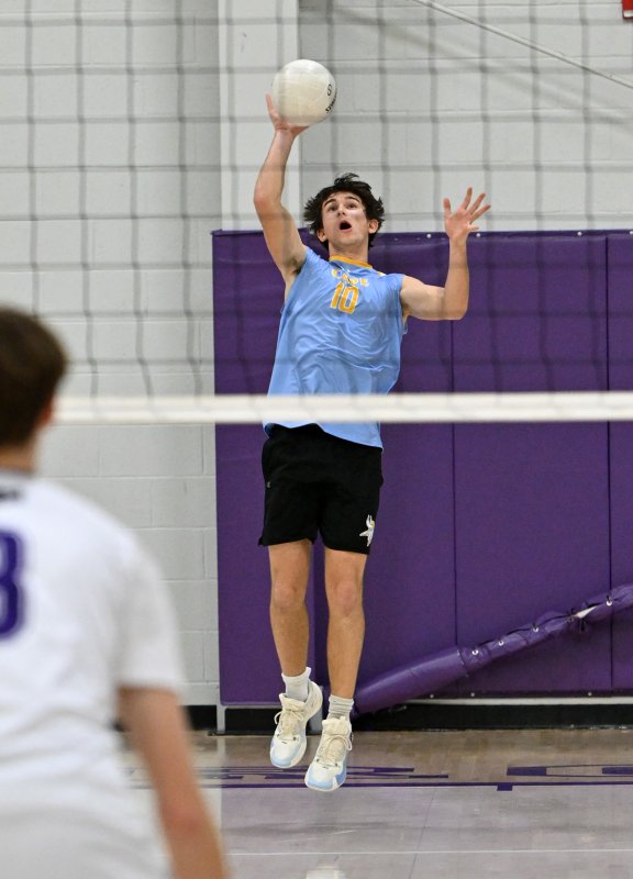 Cape senior setter Jason Harpel-Rickards slams a service winner.