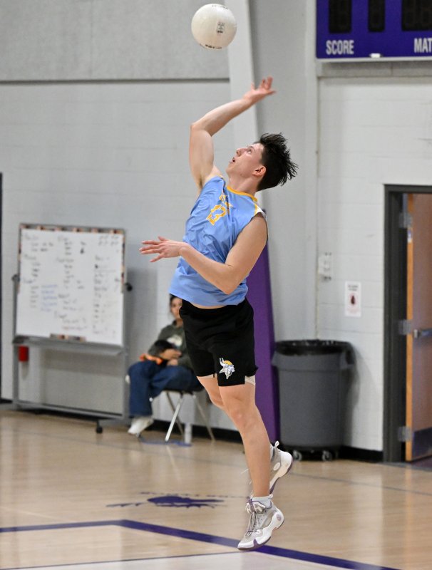 Cape senior Ryder Van Horn slams an ace.