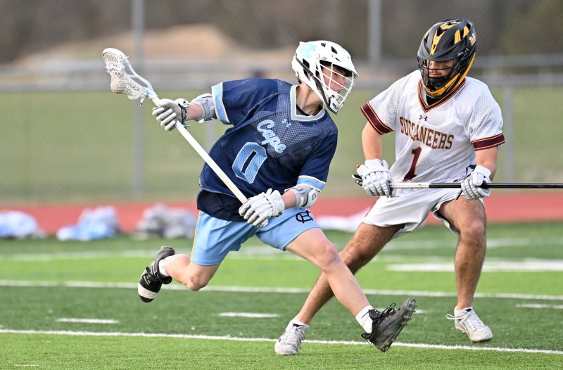 Cape senior Mathew Popovich is ready to take off to get separation from Milford’s Ryan Devereaux.