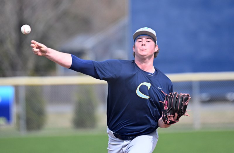 Cape junior Dom Mangini delivers to the plate in the scrimmage with Red Lion.