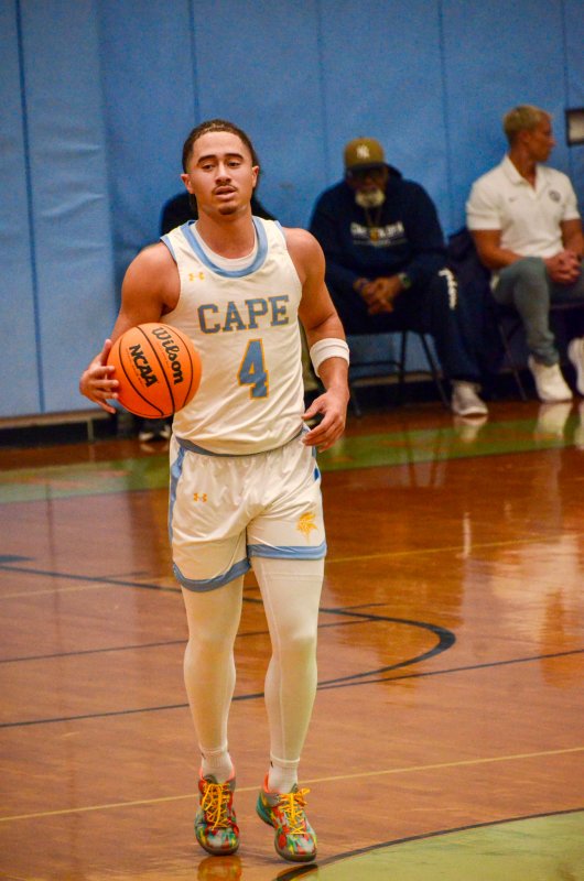 Cape junior Jameson Tingle’s dad Dwight is directly behind is son in this chance photo.