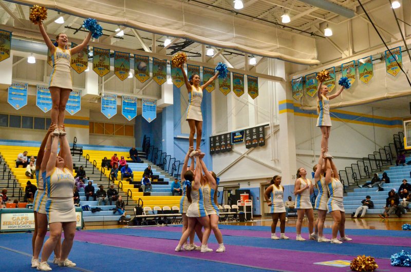 Cape cheerleaders perform some cheers and stunts before pumping up the music and showcasing their routine for the Wilmington competition held March 7-8.