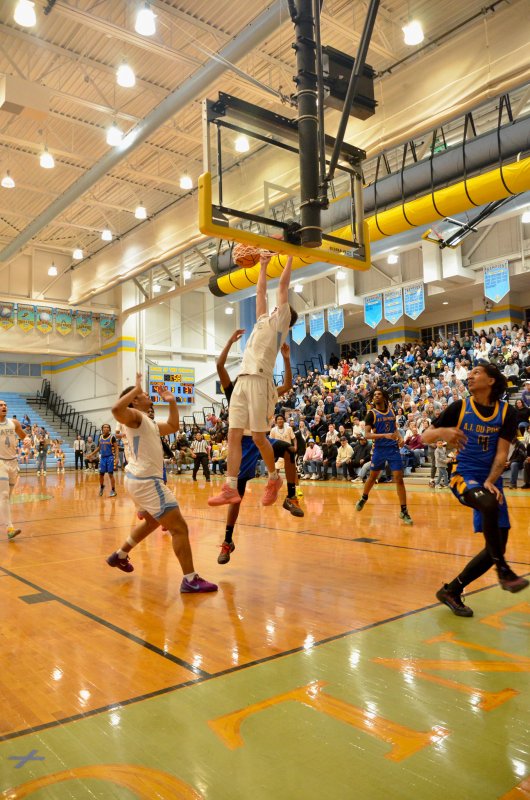 Cape senior Braxton Figgs gone some hang time on this dunk.