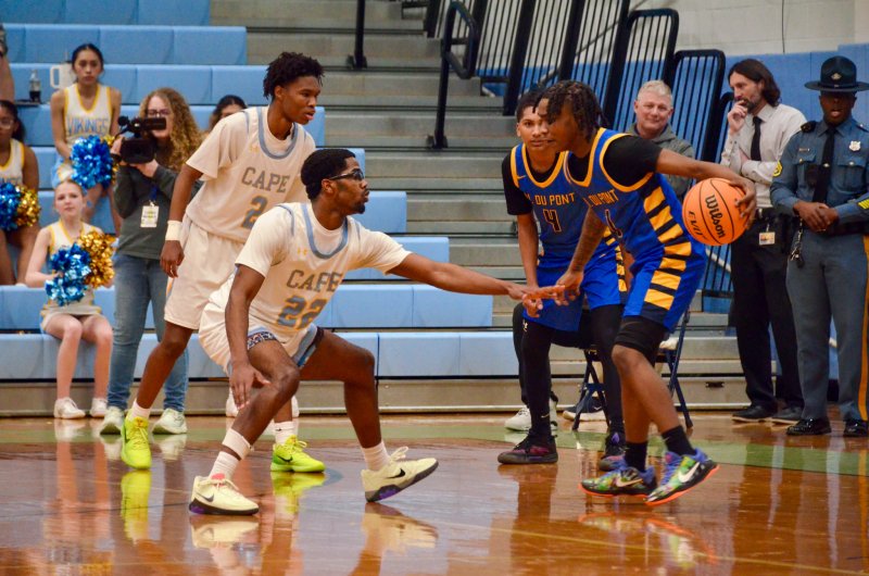 Vikings junior Oz Batson patrols the perimeter on defense with Geordan Downing.