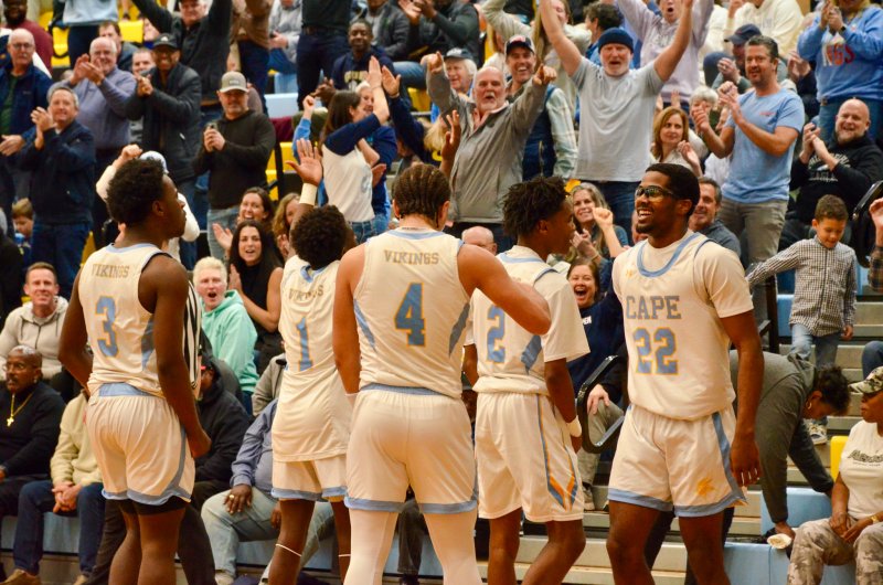 Cape players (l-r) David Barnes, Steve Sivels, Jameson Tingle, Geordan Downing and Oz Batson join the fans in elation following Downing’s buzzer-beater.