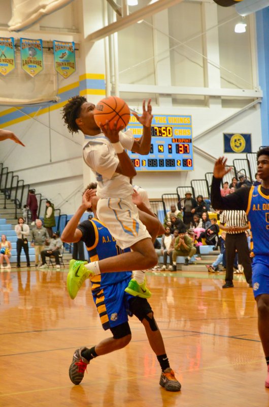 Vikings junior Geordan Downing adjusts mid-flight.