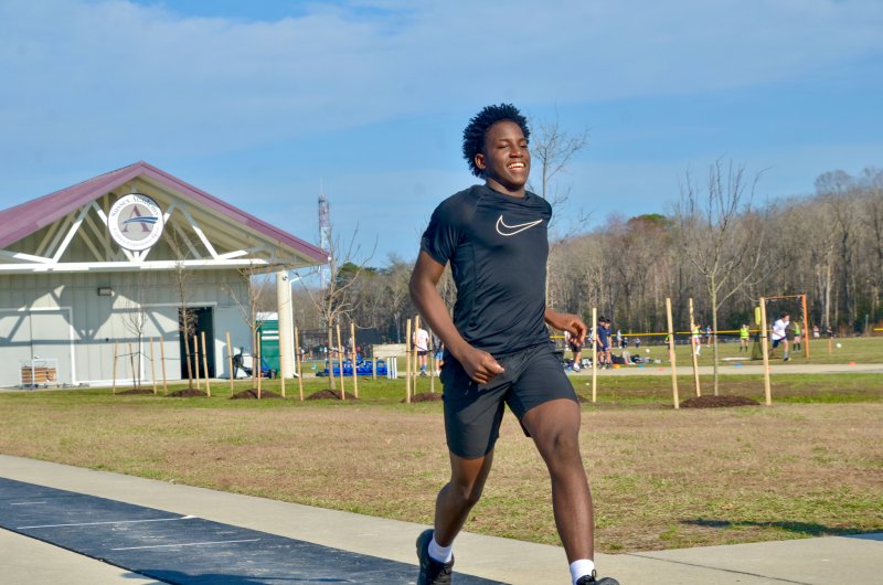 Seahawks sophomore Farmar Amisial smiles as he strides.
