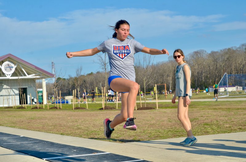 Sussex Academy junior Makenna Blades focuses on her landing.