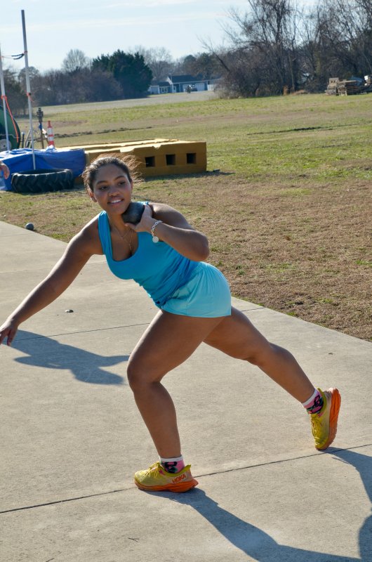 Sussex Academy junior Biloxi Buffington prepares to shoot the put.