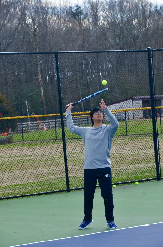 Seahawks junior Max Dadukov serves the ball with some refined skill he picked up with a personal coach in the off-season.