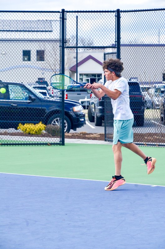 Sussex Academy senior Logan Mattie follows through.