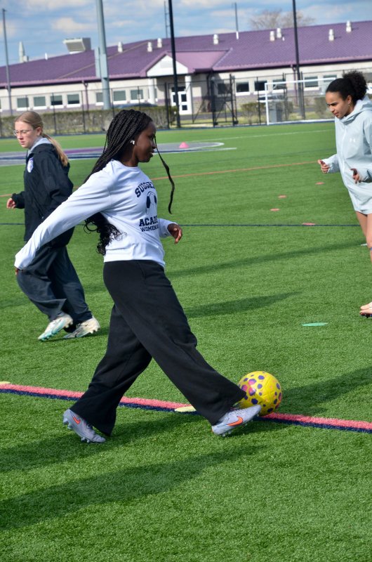 Sussex Academy senior Debora Williams lets the locks out.
