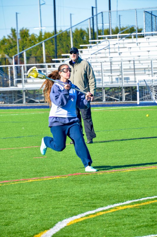 Seahawks senior Ellie Merrick moves the ball during a transition/ numbers drill.