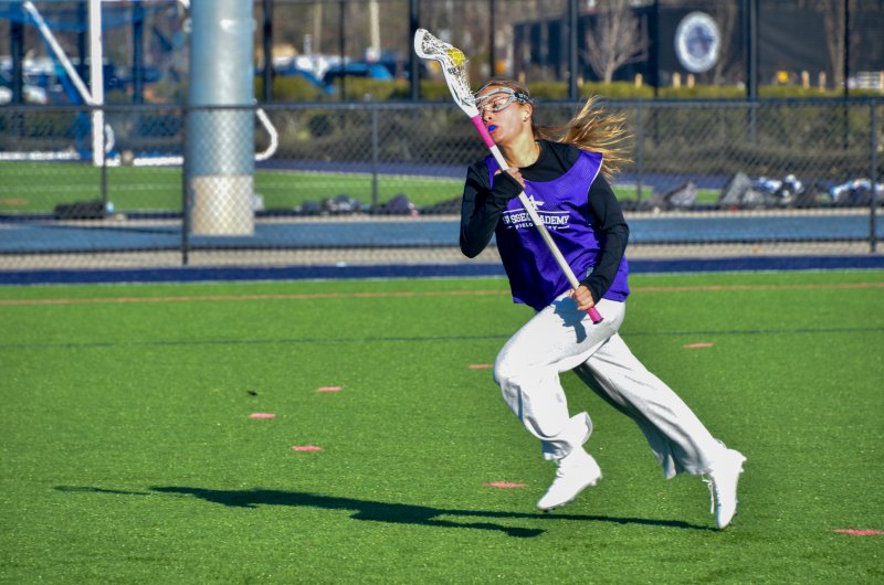 Sussex Academy sophomore Logan Stiles races out of her defensive end.