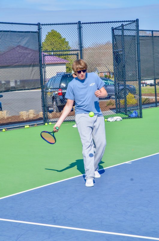 Seahawks senior Alec Dukes knocks the ball back.