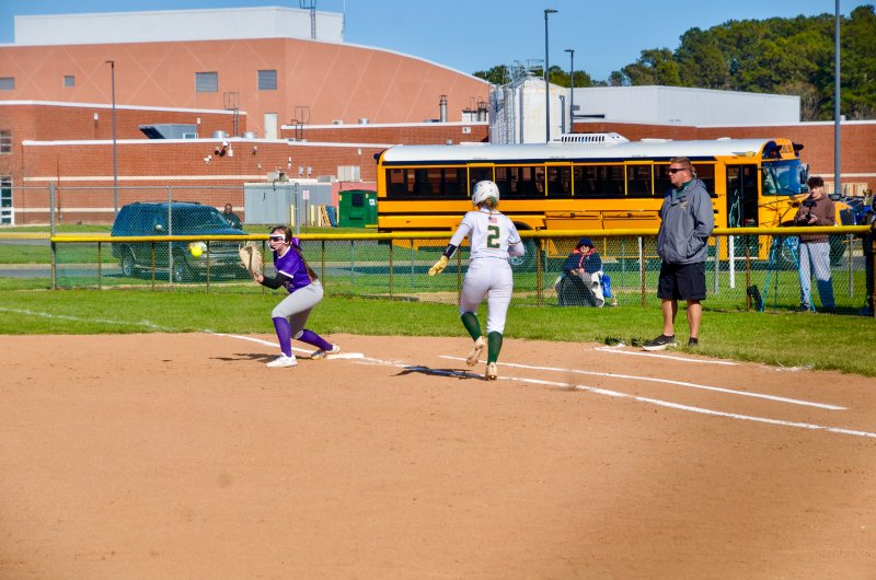 Royals eighth-grader Carsyn Riddle looks the ball into her glove for an out.