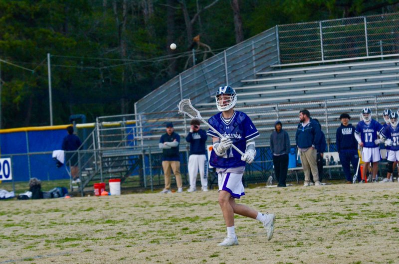 Seahawks sophomore Nicholas Warren passes the rock.