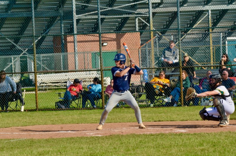 Sussex Academy senior Victor Goodhue stands in the box.
