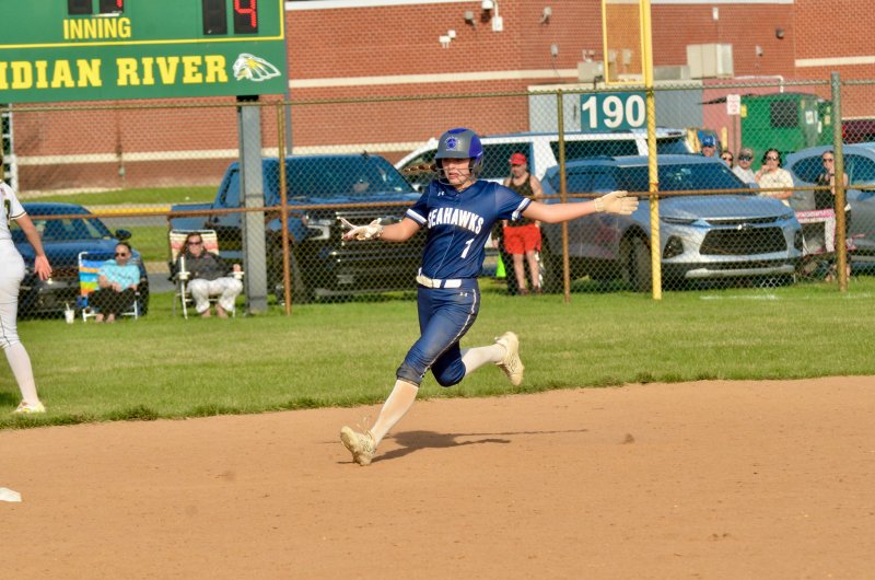 Seahawks sophomore Teagan Forester glides into second after nearly going yard.