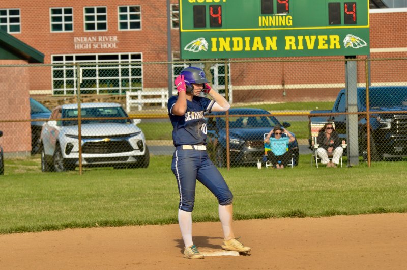 Seahawks freshman Danica Bergh adjusts her helmet after driving in two runs.