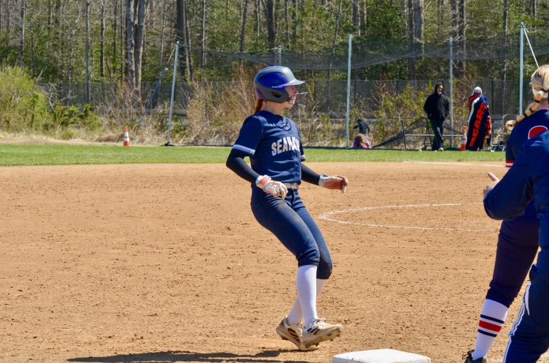 Seahawks freshman Emma Orlen stops at third base.