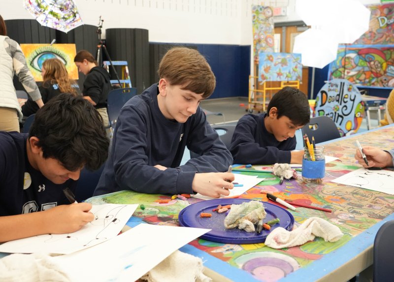 Focused on their drawings are (l-r) Arjun Verma, Josh Schultz and Neil Shenoy.
