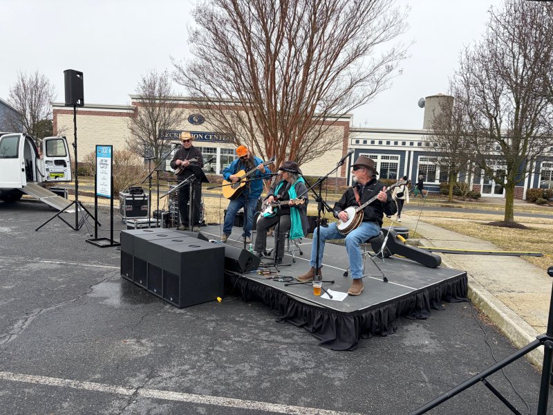 Homestead Bluegrass entertains the crowd at 302 Day at Dogfish Head in Milton March 7.