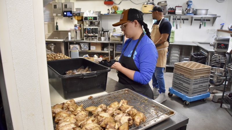 Laila Sellers is focused and determined when preparing food for Bluecoast Seafood Grill & Raw Bar.