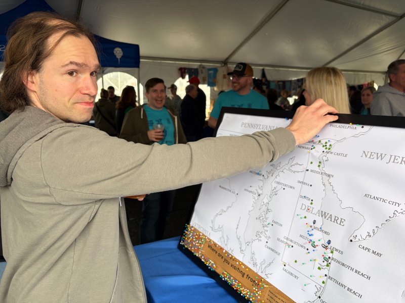 Those visiting 302 Day, such as Robert Brewer, were encouraged to put a pin in the map indicating where they came from.