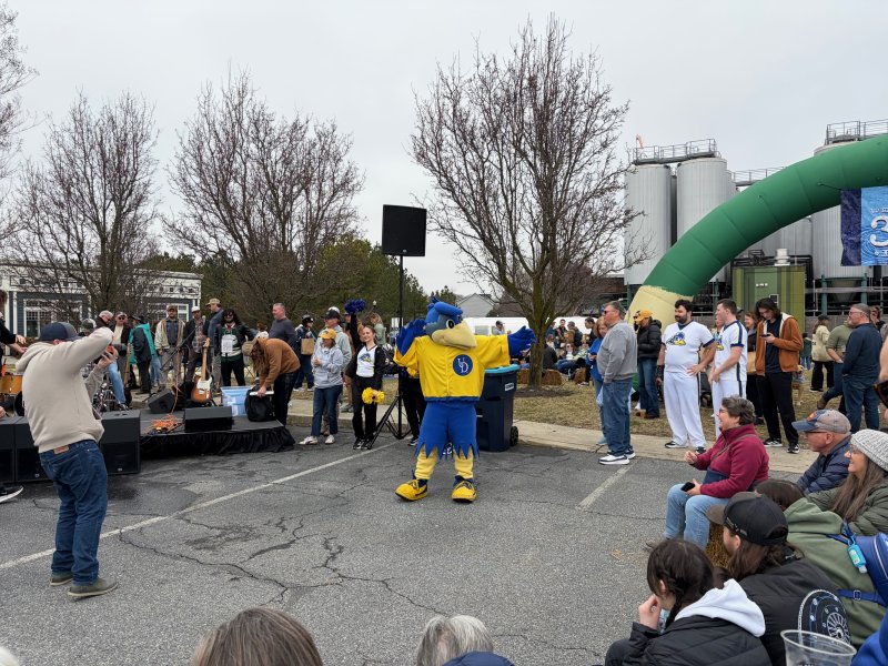 University of Delaware mascot YoUDee fires up the crowd during the raffle reveal.