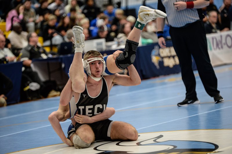 Logan King of Sussex Tech defeats Ryan Smith of Charter School for third place in the 138-pound division.