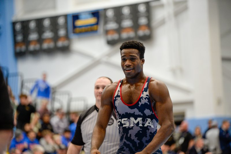 Josh Jalloh of First State Military beats Carter Dulin of Polytech in 190-pound third-place match.