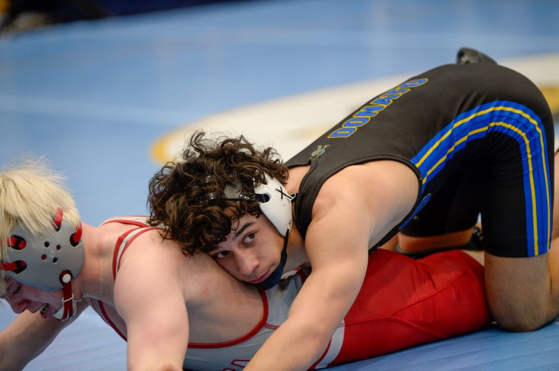 Ben Donato of Caesar Rodney is a state champ at 113 pounds.