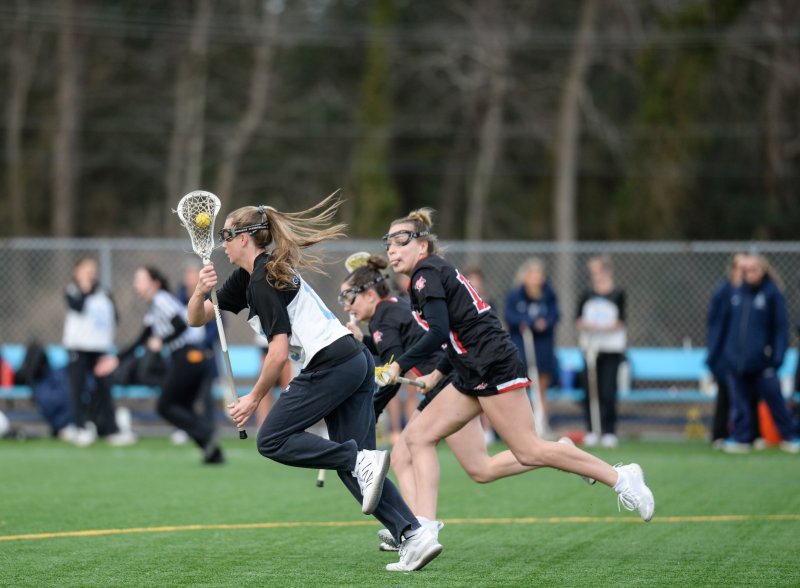 Alley Diehl wins the draw and heads to goal.