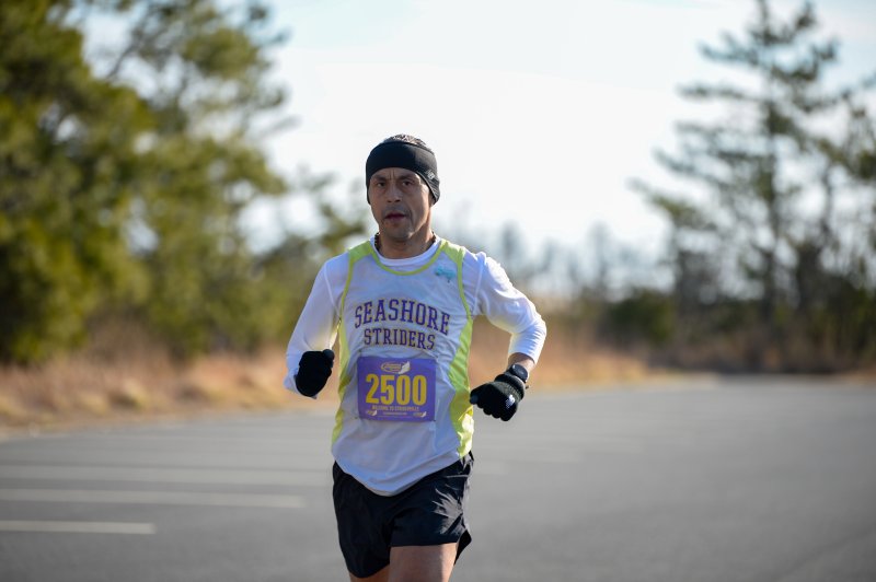 Martin Rodriguez wins the half-marathon in 1:25:54.