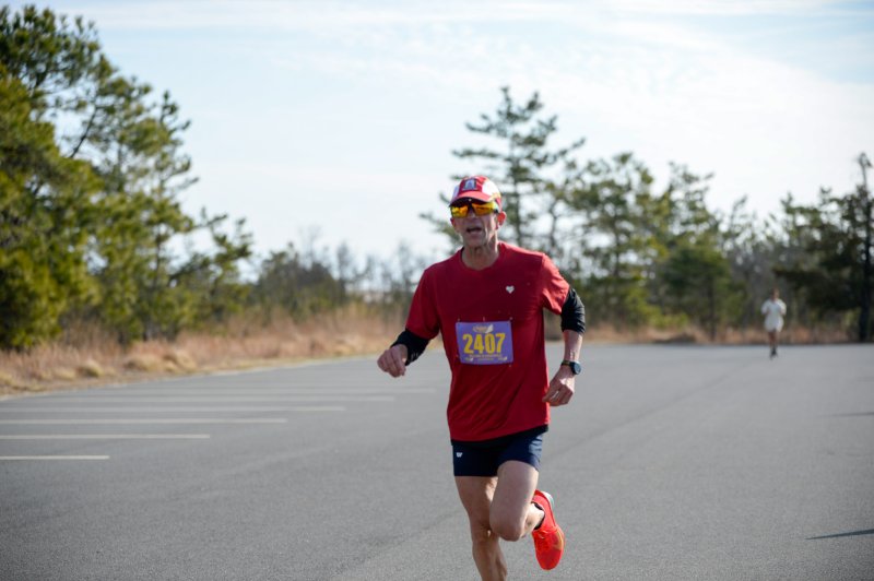 Paul Timmons wins his age group in 1:36:26.