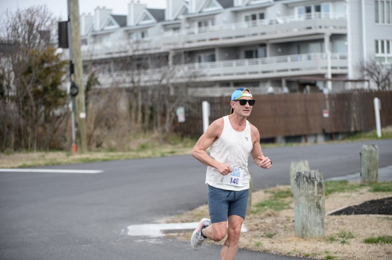 Kevin Kornegay wins the masters race in 21:13.