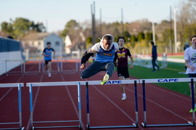 Elijah Shockley-Taylor wins the 300-meter hurdles. DAVE FREDERICK PHOTO