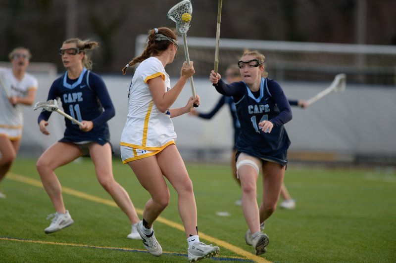 Mairead Rishko, with wrapped hamstring, plays defense.