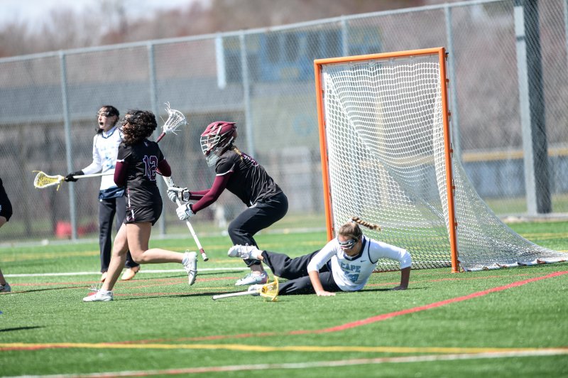 Kemper Cox is knocked to the turf.